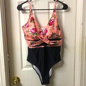 NWOT floral & flattering Size large once piece swimsuit